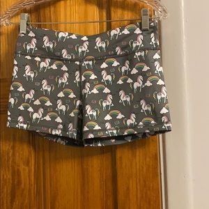 Grey workout shorts with unicorns and rainbows